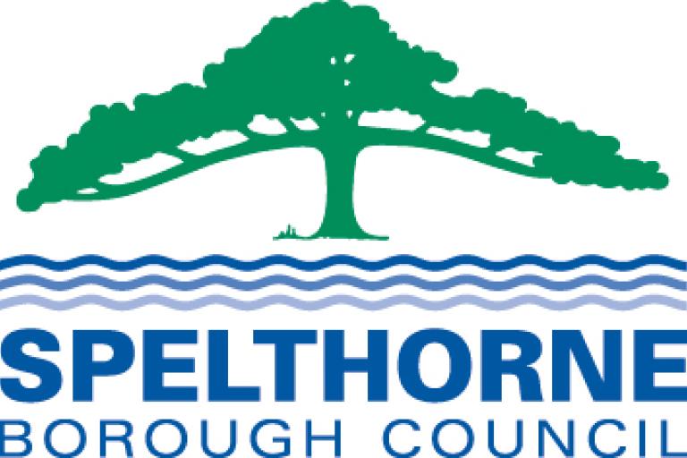 a green tree atop a blue river over the words spelthorne borough council